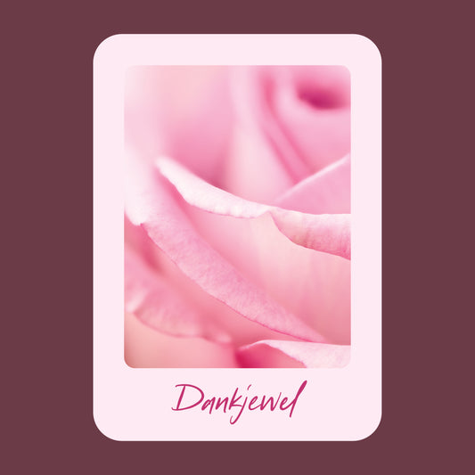 Productfoto van een wenskaart met de tekst "dankjewel" met een foto van roze roos.